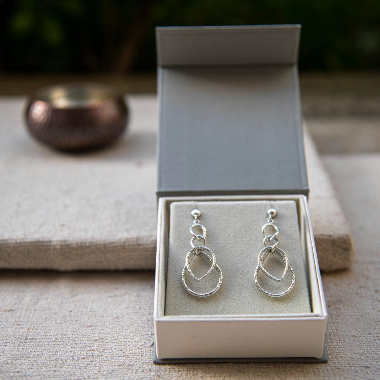Intertwined Oval Silver Dangler Earring